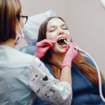 how to care for your mouth after tooth exposure surgery